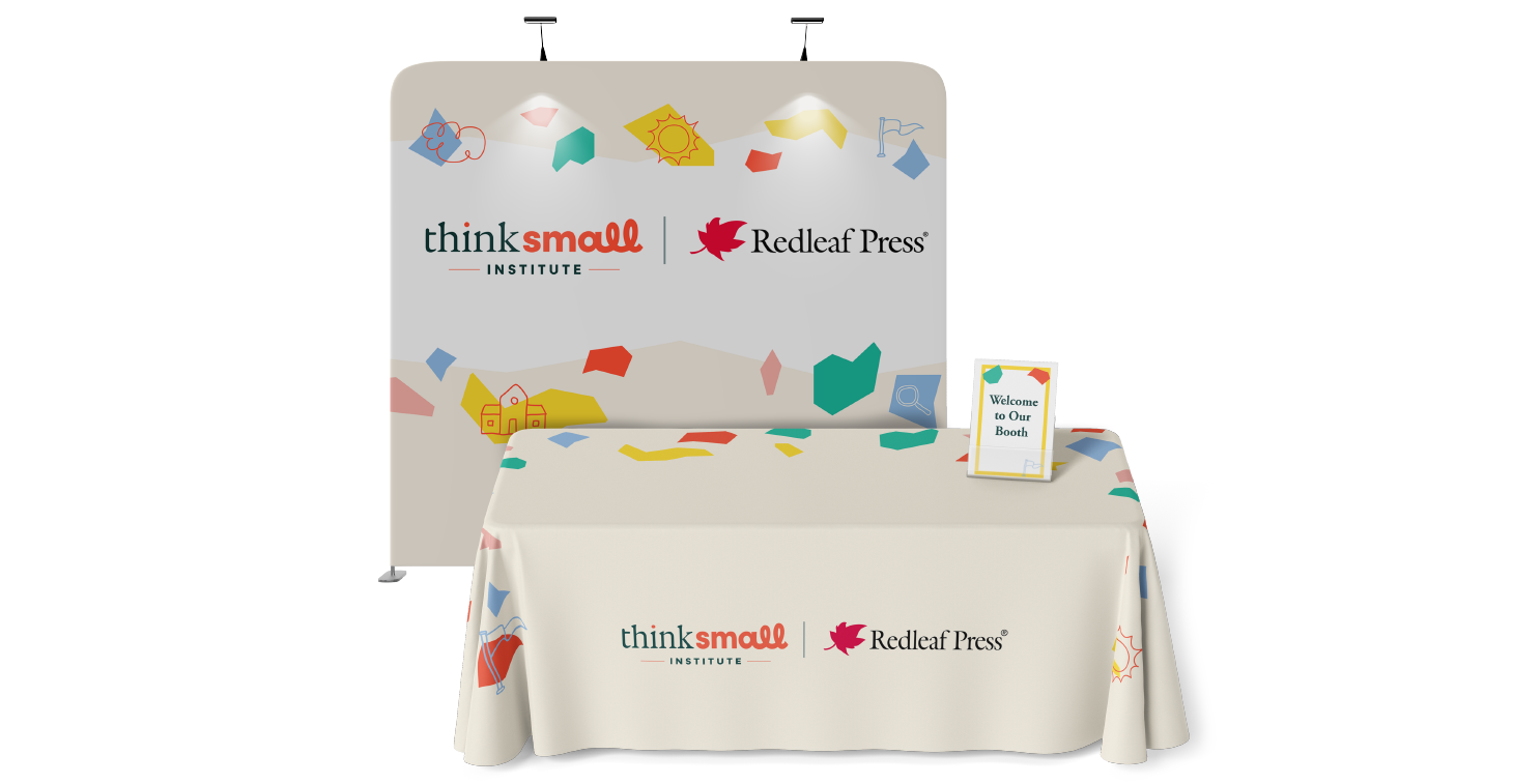 A co-branded Think Small and Redleaf Press conference booth display showing the designs of their backdrop and table cloth.