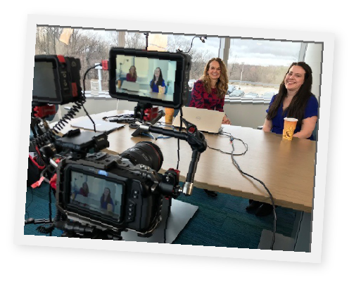 Kara Lehnhardt and Beth Holmes preparing for a video shoot