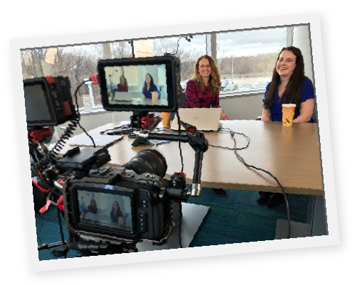 Kara Lehnhardt and Beth Holmes preparing for a video shoot