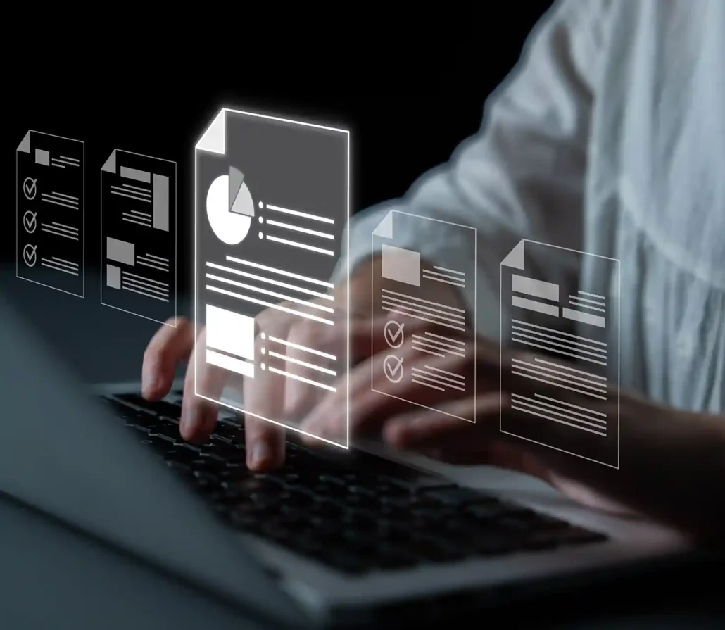 Hands typing on a laptop with icons overlayed