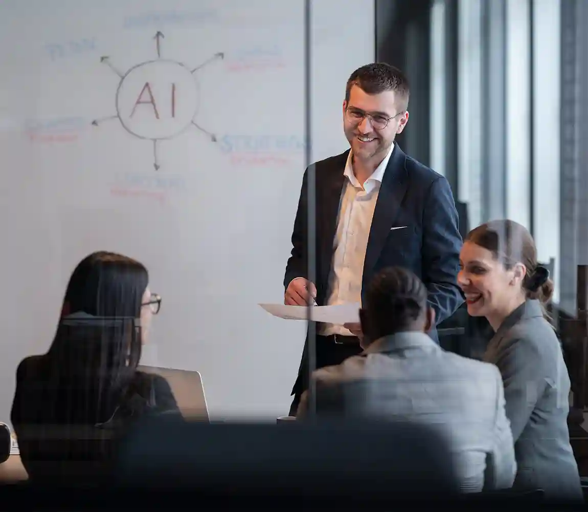 A man teaching a group of people about AI